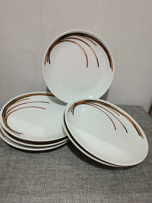 Porcelain plates set of six large like new