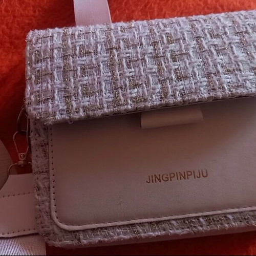 Beige shoulder bag with gold and white details like new
