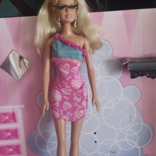 Barbie doll with 2012 Budget Heart Dress Glitz Barbie outfit