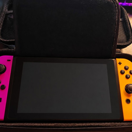 Nintendo Switch V1 patched used with 128GB Mario SD card and case
