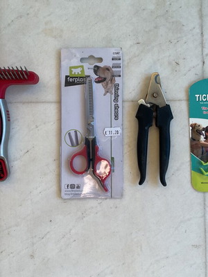 Dog grooming set used with double brush, thinning comb, nail clipper, tick remover