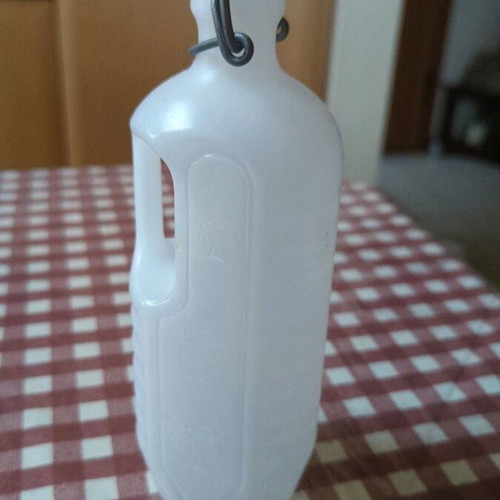 Plastic bottle with safety cap unused