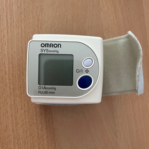 Omron digital wrist blood pressure monitor used