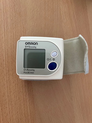 Omron digital wrist blood pressure monitor used