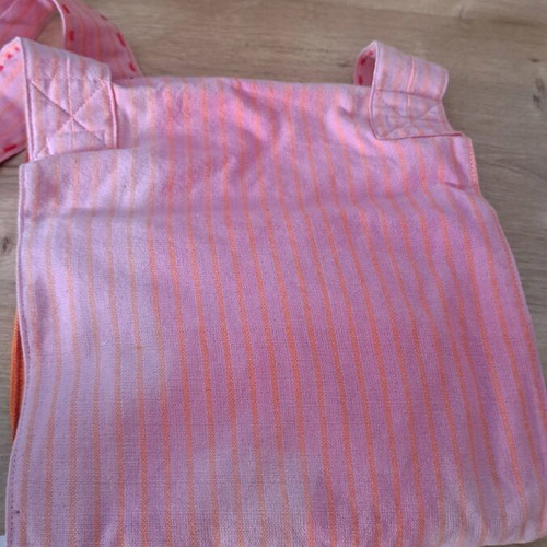 Cloth bag with doll and clothes used
