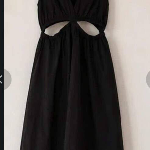 Black dress with cutouts like new