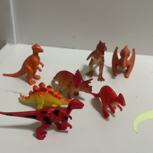 Small dinosaur figures for collection