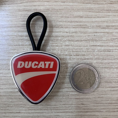 Ducati Official metal keychain with red and white enamel shield design