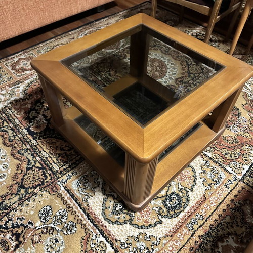 Set of two wooden square coffee tables with glass tops