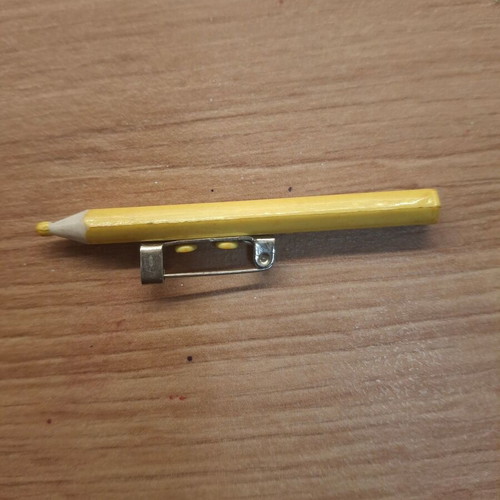 Yellow pin brooch