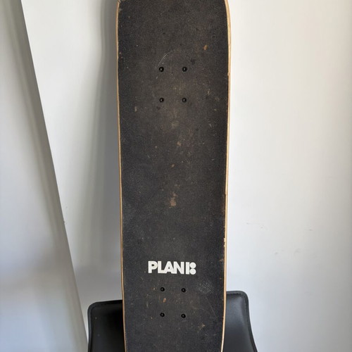 Plan B skateboard used with normal grip tape wear