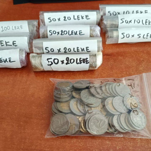 Albanian coins used, total 25,580 ALL in various denominations