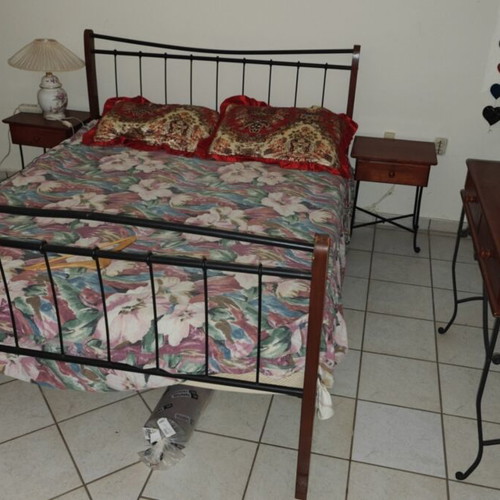 Metal and wood bed used