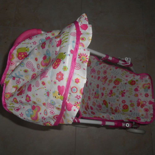 Doll stroller used, dimensions 60x60x25 cm