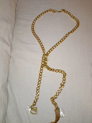 Necklace in gold tone used with decorative elements