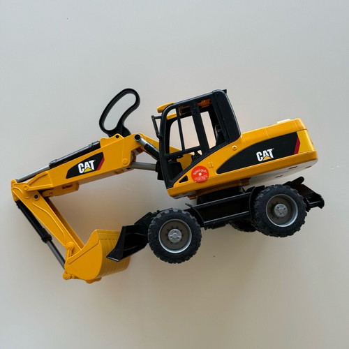 Bruder CAT Excavator used with wheels and shovel