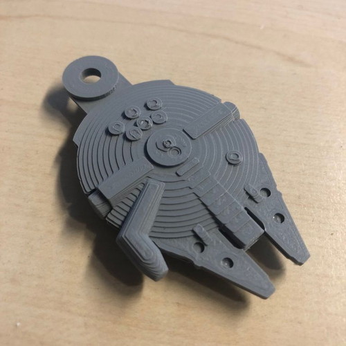 Millennium Falcon keychain new, size 30x42x8 mm