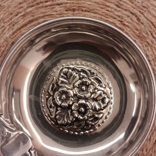 Vintage silver-plated ashtray with floral decorative motif like new