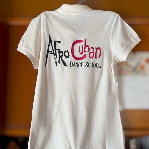 Polo shirt like new with embroidered dance school logo, size M