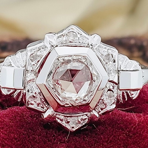 Women's ring with rare natural pink diamonds and 18 ct white gold
