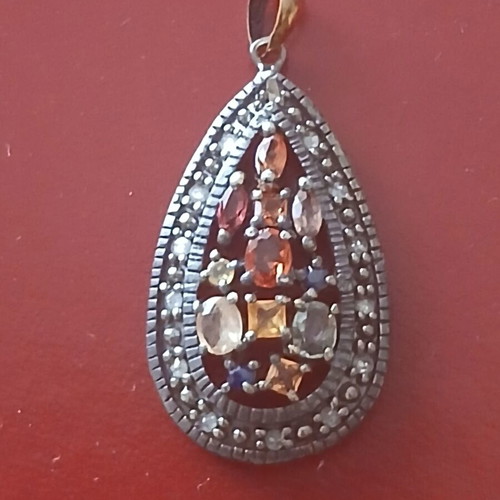 Pendant with semiprecious stones and diamonds, 925 silver and 9k gold ring