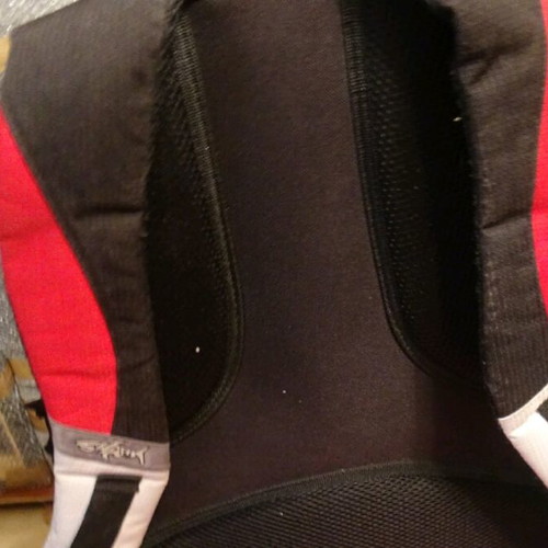 School bag used, red with multiple compartments