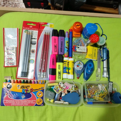 Pens and mechanical pencils used, with cases, erasers, sharpeners
