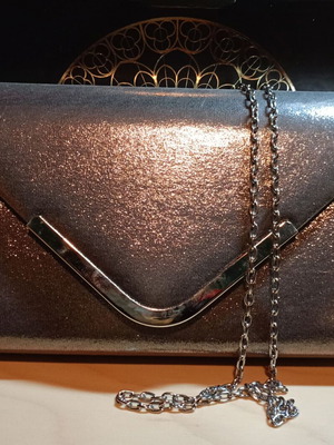 Clutch bag metallic silver with chain like new