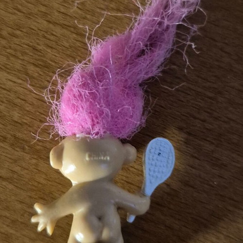 Vintage Troll figure with pink hair and tennis racket, used, rubber stamp base
