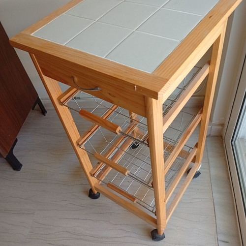 Classic wooden kitchen trolley with ceramic tile top