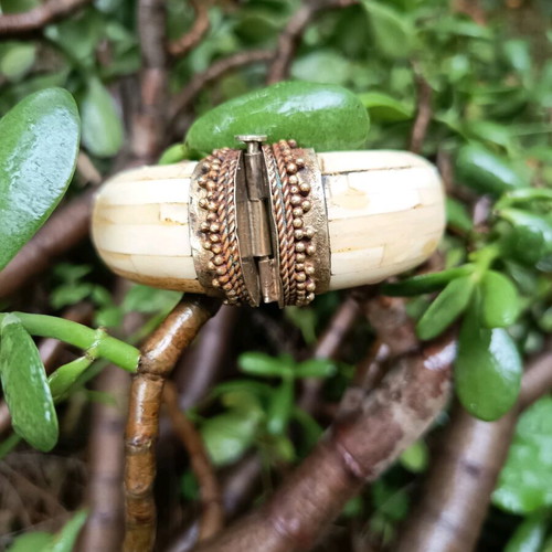 Boho bracelet used with bronze details beige
