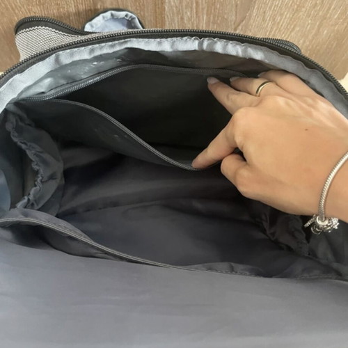 Baby bag with thermos holder and changing mat used