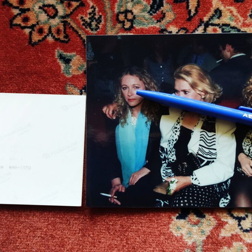 Authentic photo of Aliki, Marinella, and Nora in like-new condition