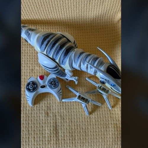 RoboRaptorX toy used, broken legs, original remote included