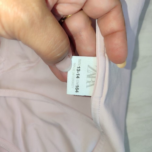 Zara pink bodysuit and white denim shorts set