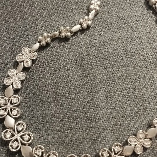 Riviera necklace with flower and four-leaf motifs, silver