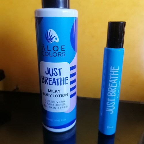 Body lotion and roll-on perfume set, new