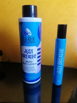 Body lotion and roll-on perfume set, new