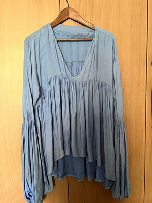 Silk baby blue blouse with puffed sleeves