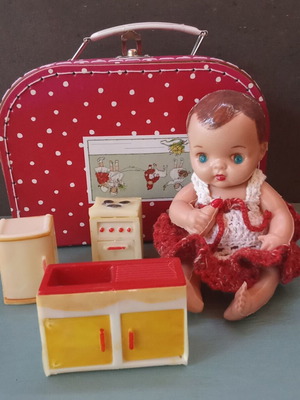 Vintage doll with vintage suitcase and furniture