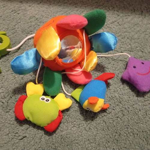 Hanging octopus baby toy used with mirror and sound animals