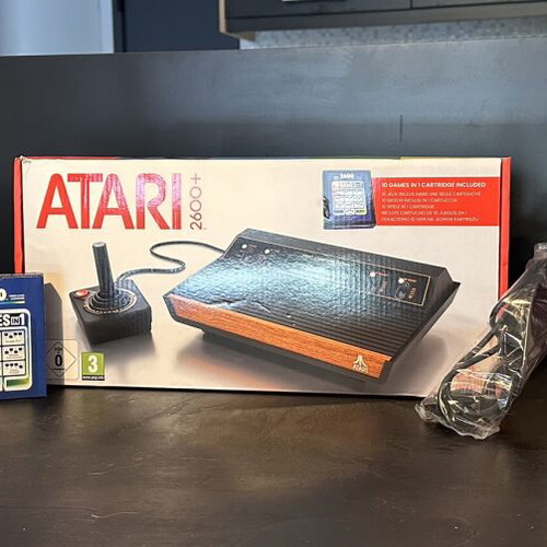 Atari 2600 Plus console like new with extra wireless controller