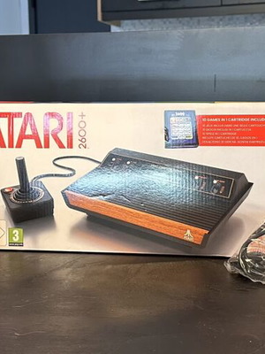 Atari 2600 Plus console like new with extra wireless controller