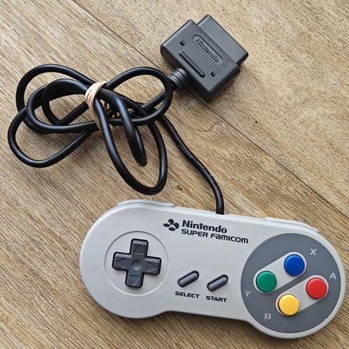 Nintendo Super Nintendo Controller like new with Super Famicom design