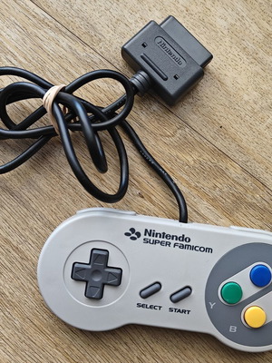 Nintendo Super Nintendo Controller like new with Super Famicom design