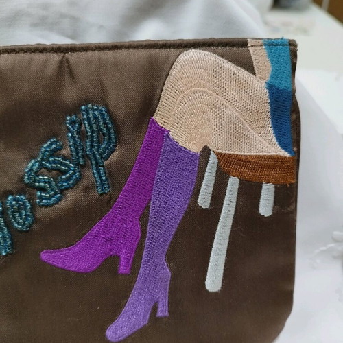 Vintage embroidered handbag used with retro design