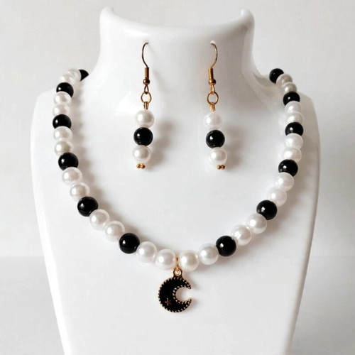 Handmade black-white beaded necklace and earings set.