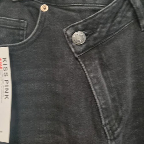 Jean with crooked button fastening black size small, new with tags