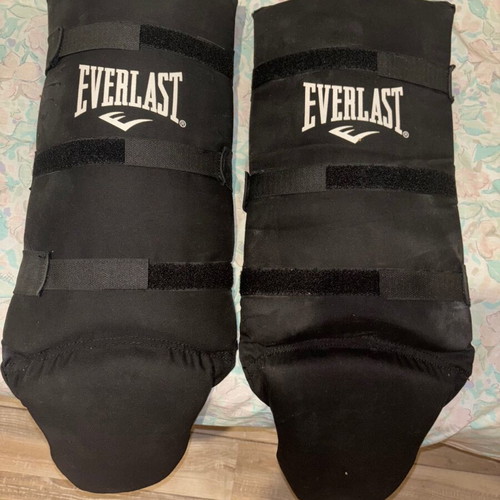 Everlast gloves and shin guards used