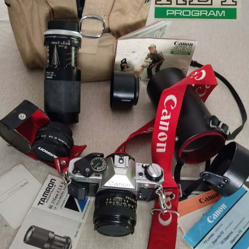 Canon AE-1 Program film camera with Canon FD28 lens and Tamron telephoto set like new
